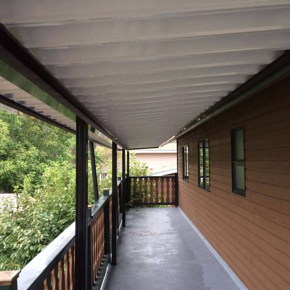 patio cover with wood railings